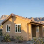 Southwestern home with a freshly finished sand-toned stucco exterior in Grand Junction, Colorado